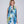 Blue oblong scarf featuring a vibrant abstract floral print for a bold patterned finish. Made from silky, lightweight fabric with a finished hem for a clean, structured look and versatile styling.